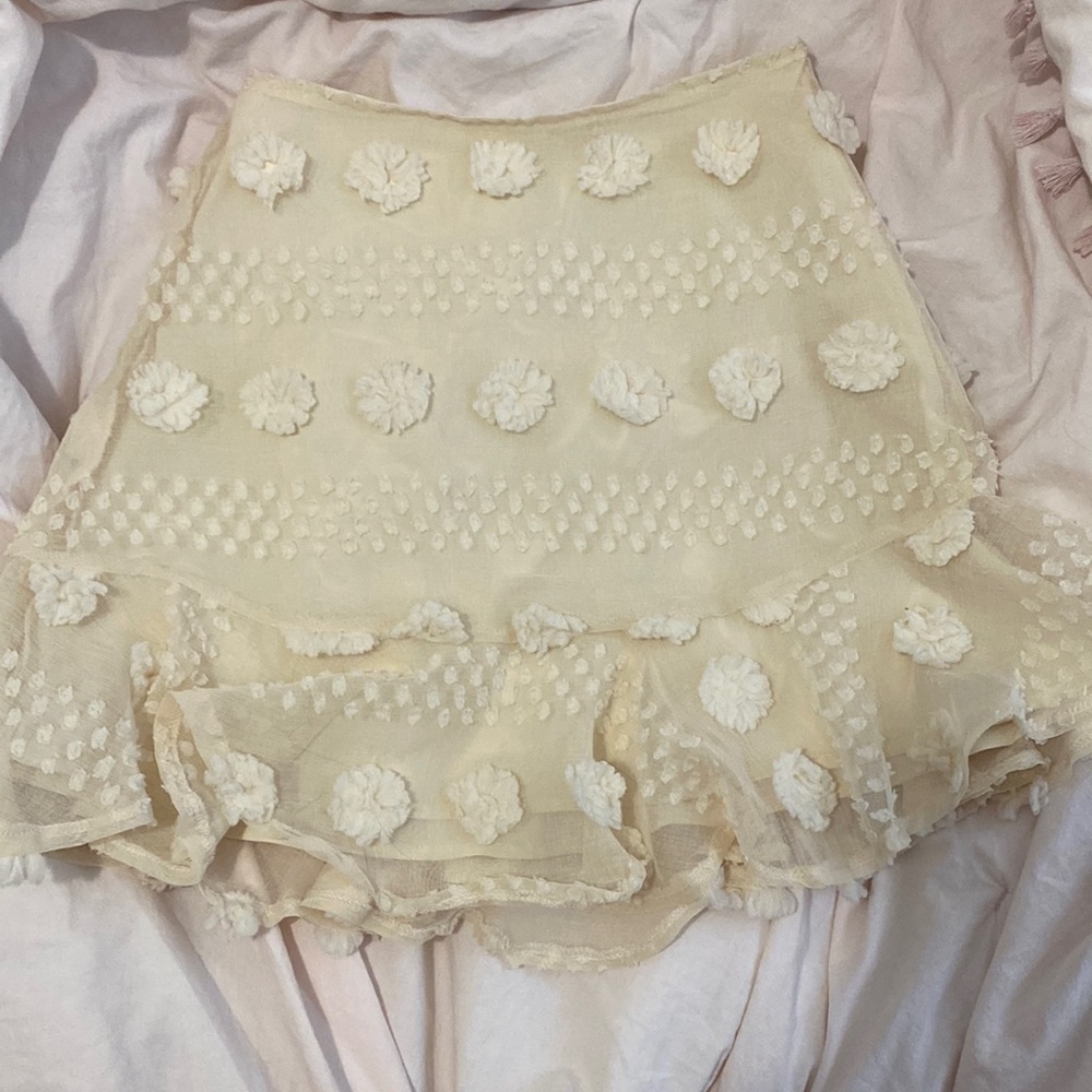 cream colored high rise skirt